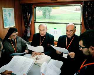 Austria.  2010. Traveling from Sankt Po?lten to Mariazell during a Pilgrimage of the CCEE Environment Commission. Mgr. Le?onard, archbishop of Mechelen-Bruxelles e Mgr. Massafra bishop of Scutari-Pult (Albania), lead the morning prayer.