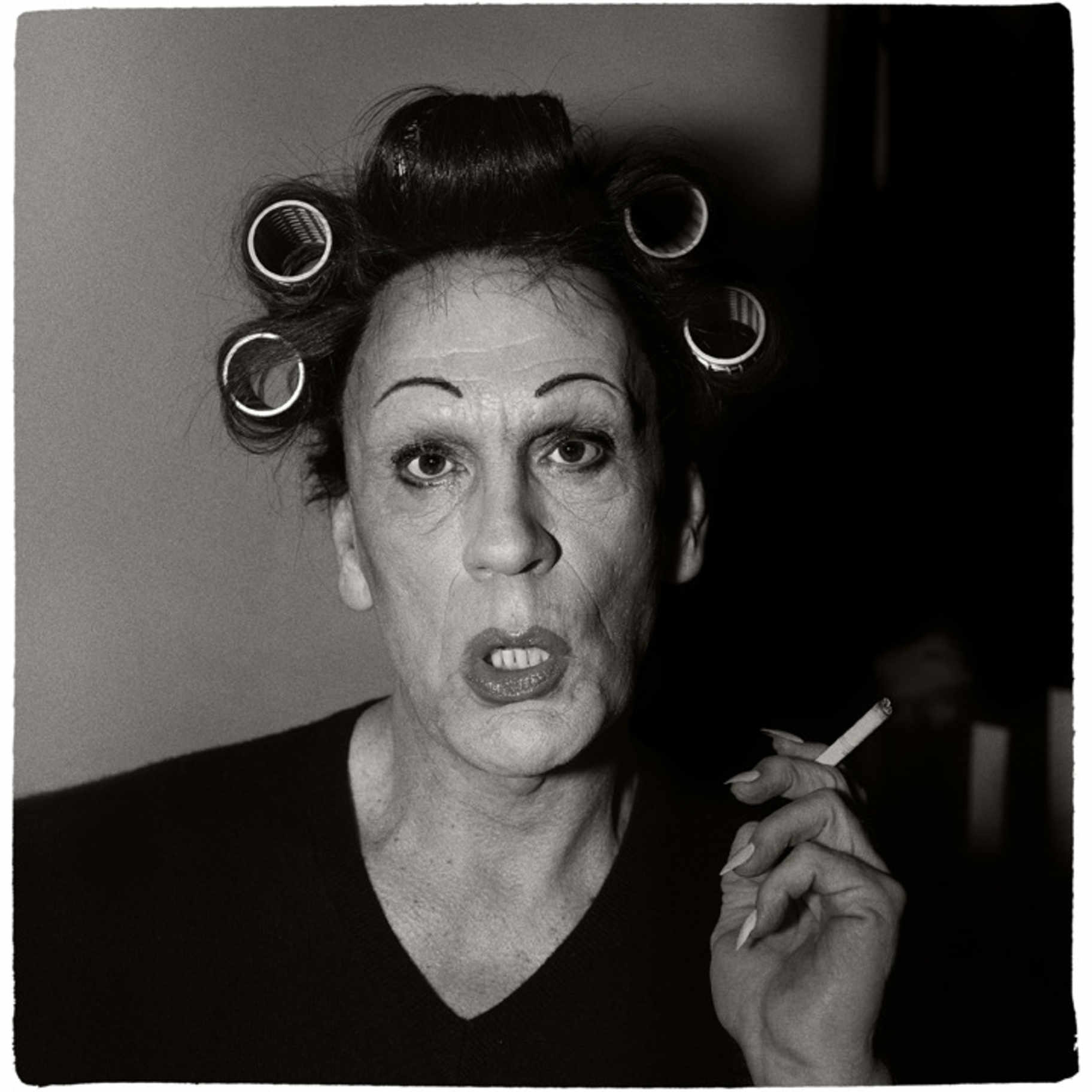 Diane Arbus, A Young Man in Curlers at Home on West 20th Street N.Y.C. (1966)