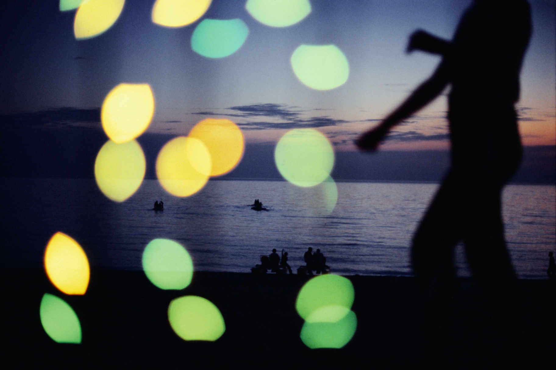People sailing out on the Black Sea, Gagra, Abkhazia. Georgia. 2005. © Jonas Bendiksen Magnum Photos