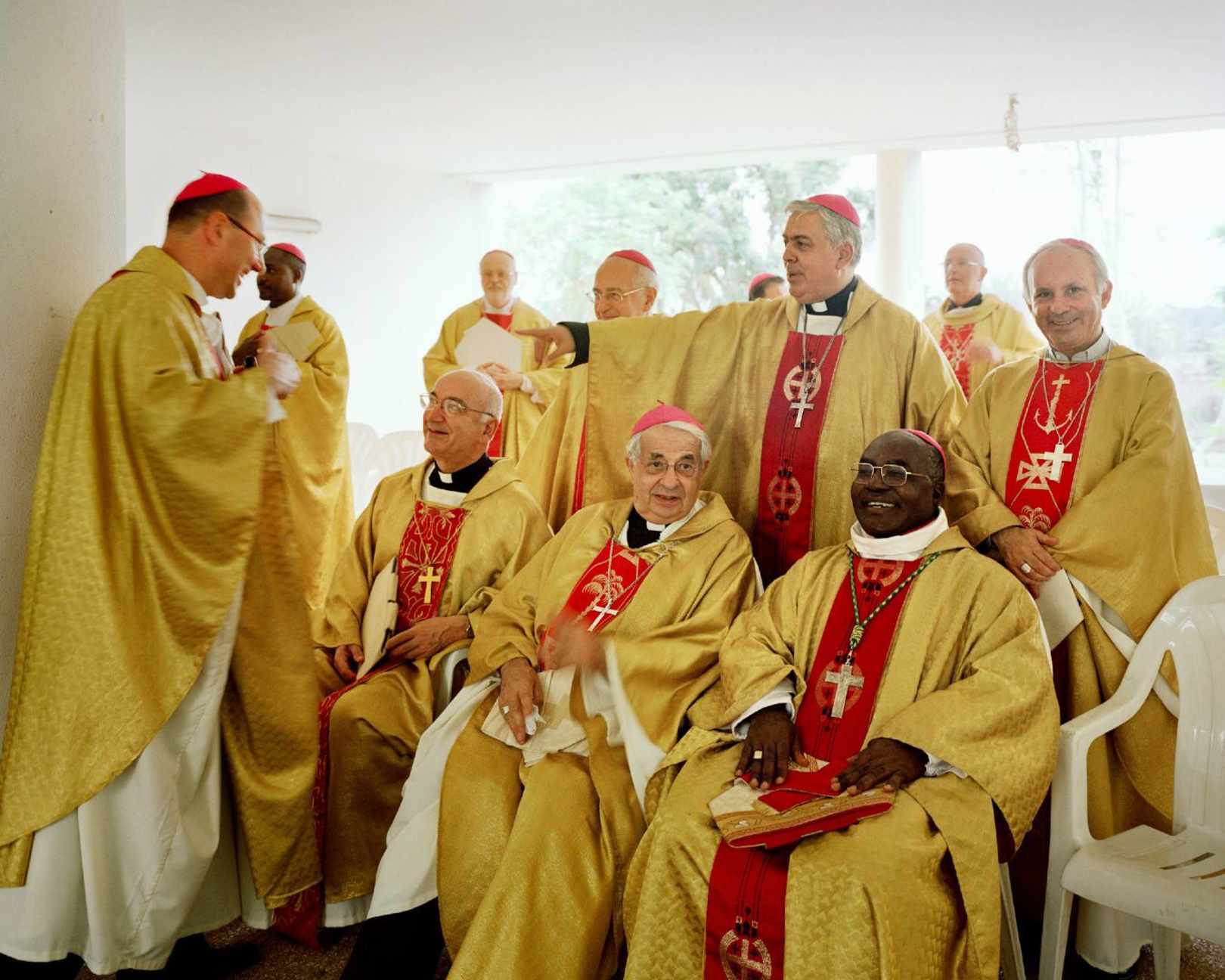 Republic of Cote d’Ivoire, Abidjan.  2010. Before celebrating the Holy Mass at St. Paul Cathedral, CCEE and SECAM members pose for a group photo. First raw from right: Mgr Ake, Mgr Defois, Mgr Jordan. Second raw from right: Mgr Dos Santos, Mgr Afonso. Mgr Polak joining the group. SECAM (Symposium of the Episcopal Conferences of Africa and Madagascar) and CCEE meet every second year.