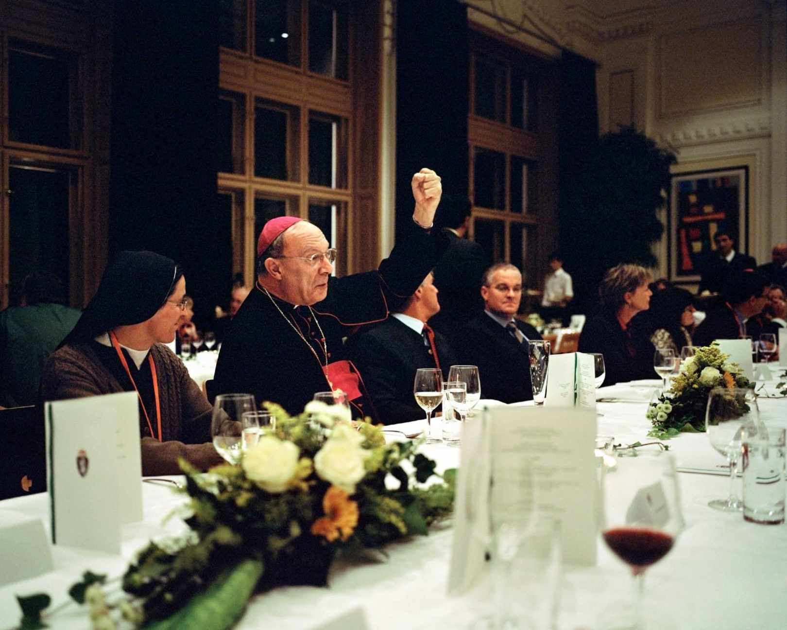 Austria, Mariazell. 2010. Convivial celebration meal with the local community representatives closing a CCEE Environment Commission meeting. Mgr Le?onard, archbishop of Mechelen-Bruxelles, singing.